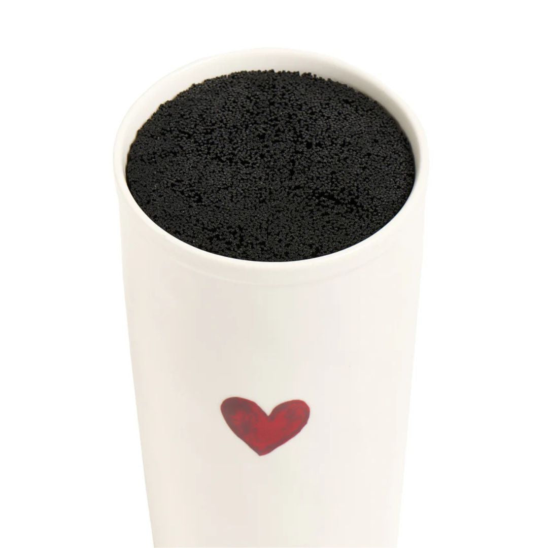 Interno in polipropilene nero del portacoltelli in grès bianco con disegno di un cuoricino rosso.