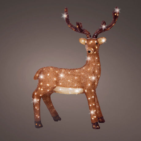 Figura decorativa in acrilico a forma di renna marrone con LED bianchi su fondo scuro.