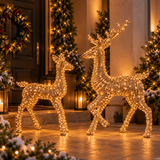 Renna e cervo luminosi oro in fibra con micro LED a luce calda ambientati all'esterno