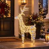 Renna luminosa Garden Team alta 104 cm con micro LED bianco caldo, posizionata all'esterno vicino alla porta d'ingresso.
