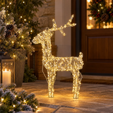 Renna luminosa Garden Team alta 57 cm con micro LED bianco caldo, ambientata all'ingresso di casa tra decorazioni natalizie.