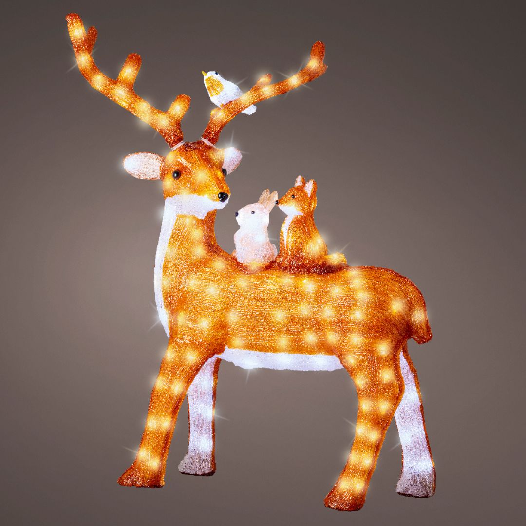 Renna luminosa con animali della foresta