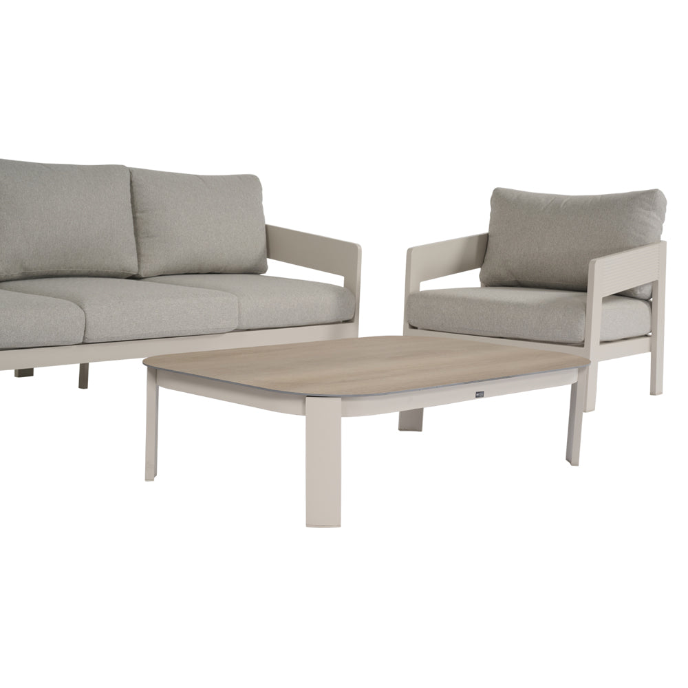 Salotto da giardino Taylor con divanetto, poltrona, tavolino basso e cuscini beige