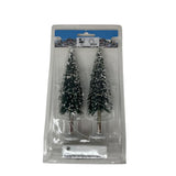 Set di due alberi innevati in miniatura con luci LED integrate, confezionati in blister trasparente.
