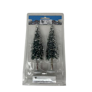 Set di due alberi innevati in miniatura con luci LED integrate, confezionati in blister trasparente.