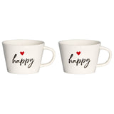 Set di due tazze in grès bianco con scritta nera "happy" e cuoricino rosso.