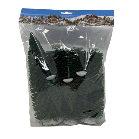 Set di nove alberi in miniatura di diverse altezze per villaggi natalizi confezionati in plastica trasparente.