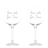 Set di due calici in vetro con scritta bianca serigrafata "bevo solo Gin Tonic".