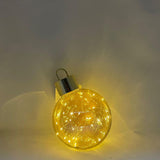 Sfera decorativa luminosa color champagne con micro LED a luce calda all’interno e tappo dorato lucido con diametro 20cm.