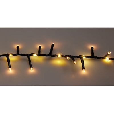 Dettaglio di catena luminosa 710 LED con cavo nero e luci alternate bianco caldo e bianco caldo tradizionale, accese e intrecciate tra loro su sfondo neutro.