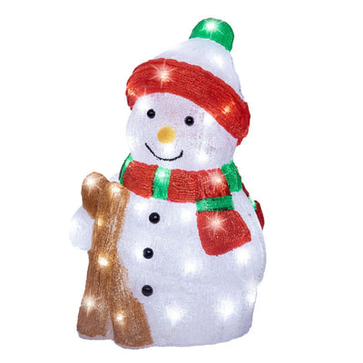 Figura in acrilico di pupazzo di neve su sondo bianco.