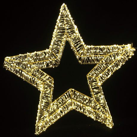 Decorazione natalizia a forma di stella dorata illuminata da micro LED bianco caldo su sfondo nero misura 50 cm.