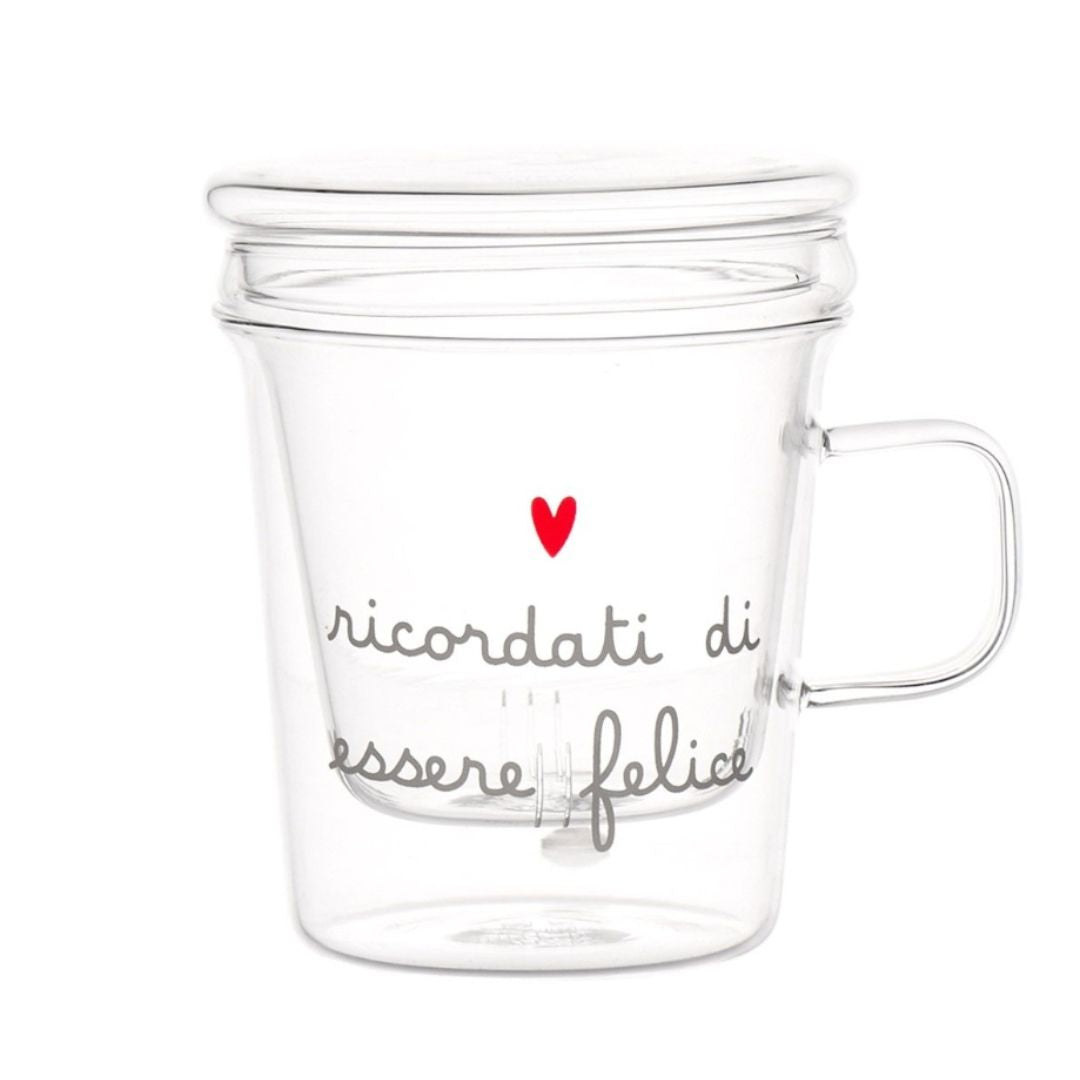 Tisaniera in vetro con filtro e coperchio decorata con scritta "ricordati di essere felice" e cuoricino rosso.
