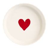 Tortiera in grès bianca con cuore rosso al centro.