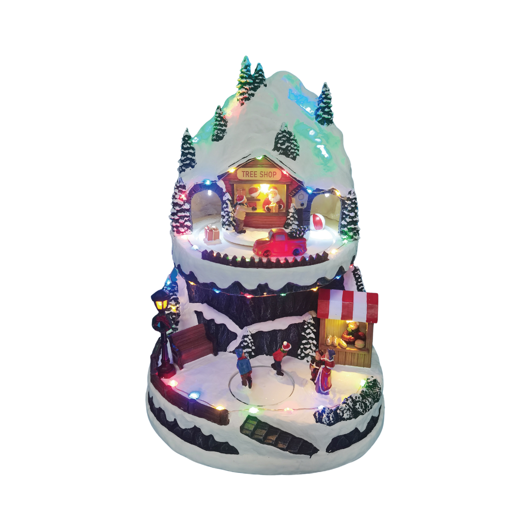 Villaggio natalizio innevato a più livelli con casetta Tree Shop, personaggi, alberi, auto rossa e luci LED multicolore integrate