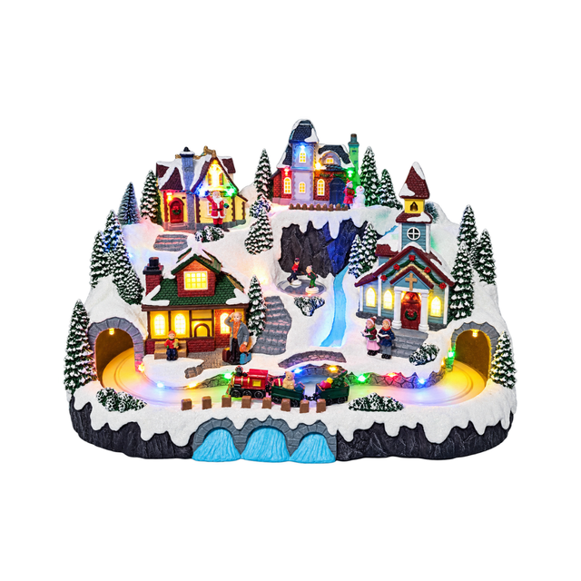 Villaggio natalizio innevato e illuminato con case, chiesa, personaggi e alberi, attraversato da un trenino tra due gallerie e decorato con luci LED multicolore