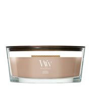 Candela WoodWick Cashmere Ellipse in vaso di vetro con coperchio in legno.