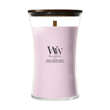 Candela WoodWick Cherry Blossom & Vanilla grande in vaso di vetro con coperchio in legno.