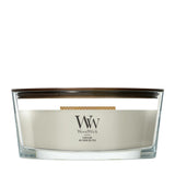 Candela WoodWick Fireside Ellipse in vaso di vetro con coperchio in legno.