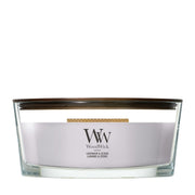 Candela WoodWick Lavender & Cedar Ellipse in vaso di vetro con coperchio in legno.