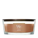 Candela WoodWick Radiant Amber Ellipse in vaso di vetro con coperchio in legno.