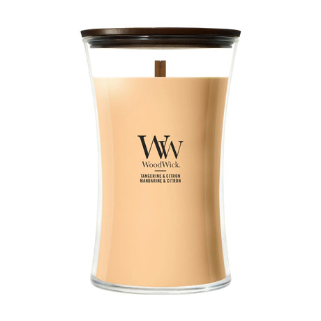 Candela WoodWick Tangerine & Citron grande in vaso di vetro con coperchio in legno.