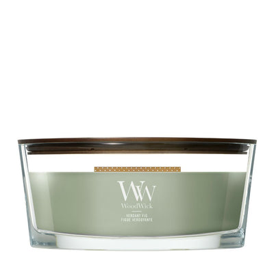 Candela WoodWick Verdant Fig ellipse in vaso di vetro con coperchio in legno.