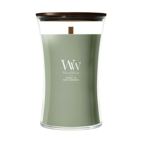 Candela WoodWick Verdant Fig grande in vaso di vetro con coperchio in legno.