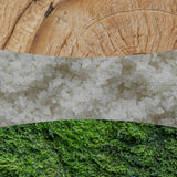 Collage con legno chiaro, cristalli di sale e muschio verde che richiamano la profumazione della candela.