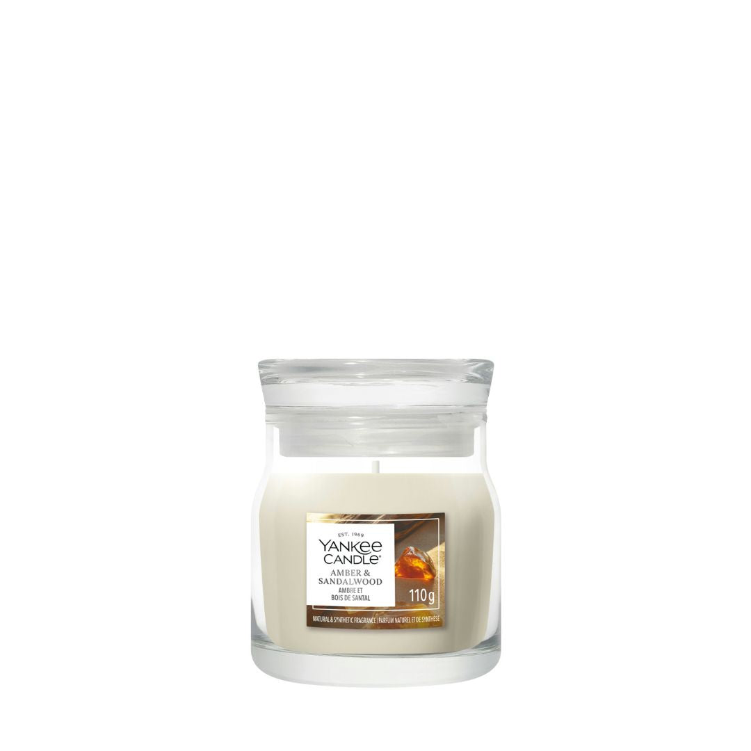 Candela Yankee Candle Amber & Sandalwood piccola in giara di vetro.