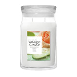 Candela Yankee Candle Blooming Love grande in giara di vetro.