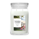 Candela Yankee Candle Coconut Beach grande in giara di vetro.