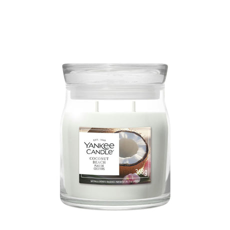 Candela Yankee Candle Coconut Beach media in giara di vetro.