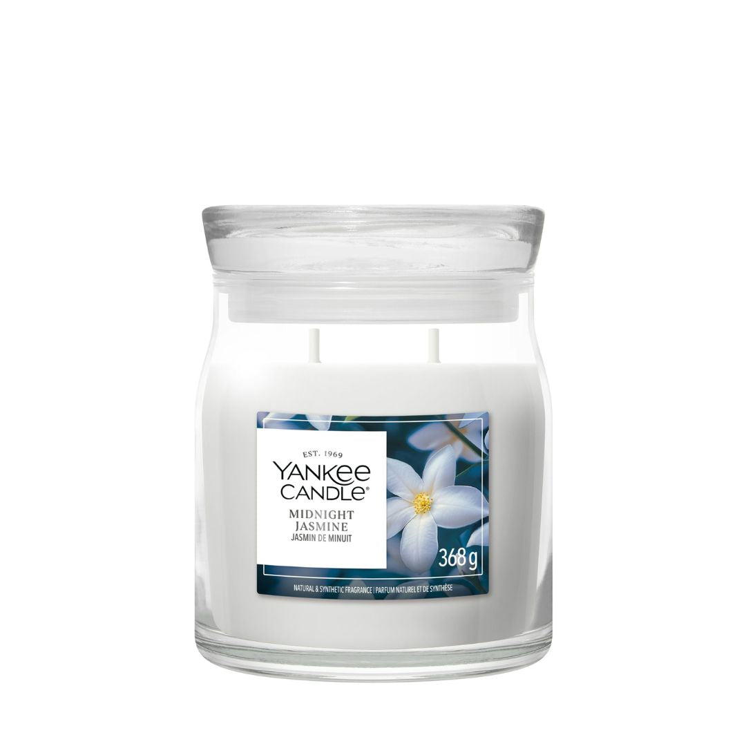 Candela Yankee Candle Midnight Jasmine media in giara di vetro.