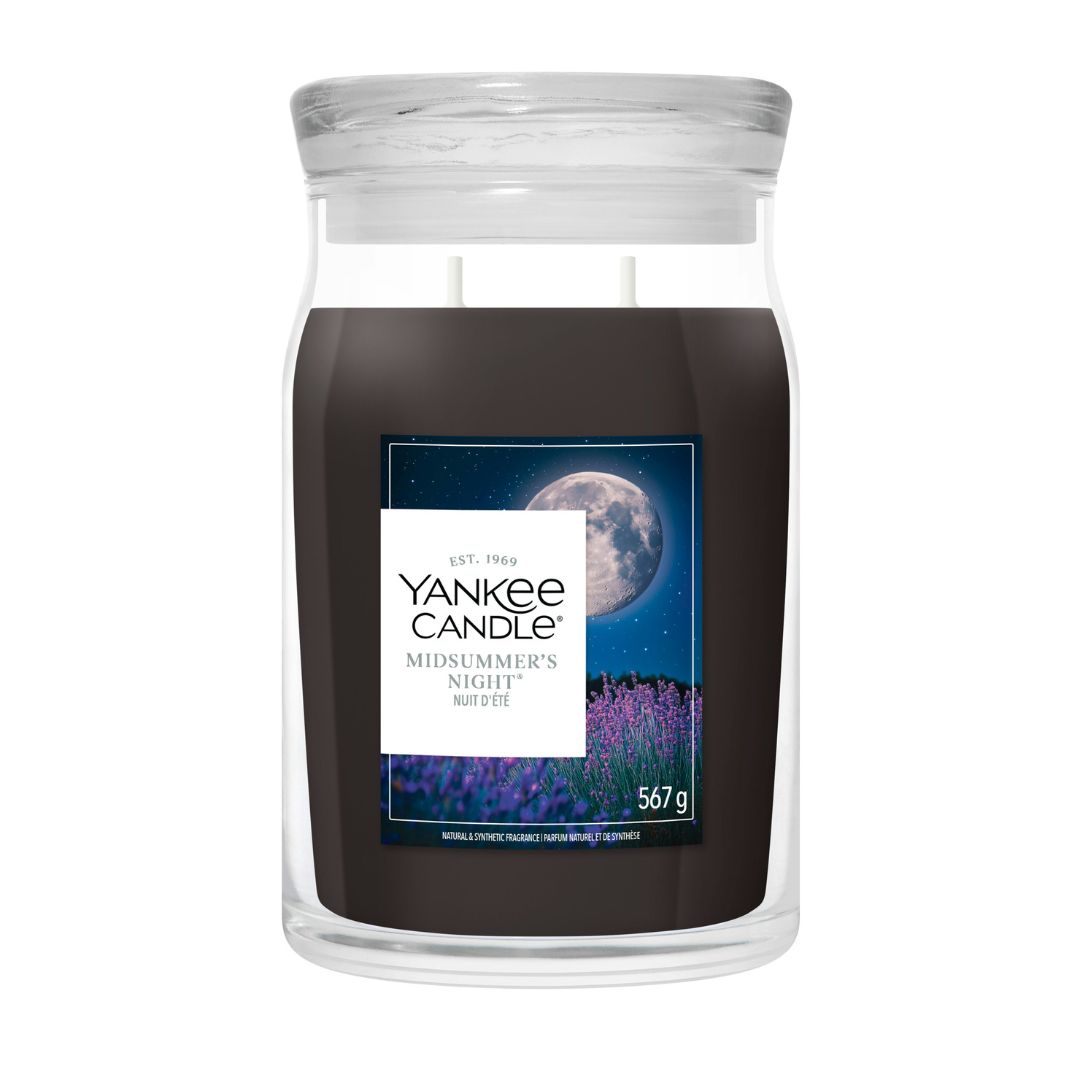 Candela Yankee Candle Midsummer’s Night grande in giara di vetro.