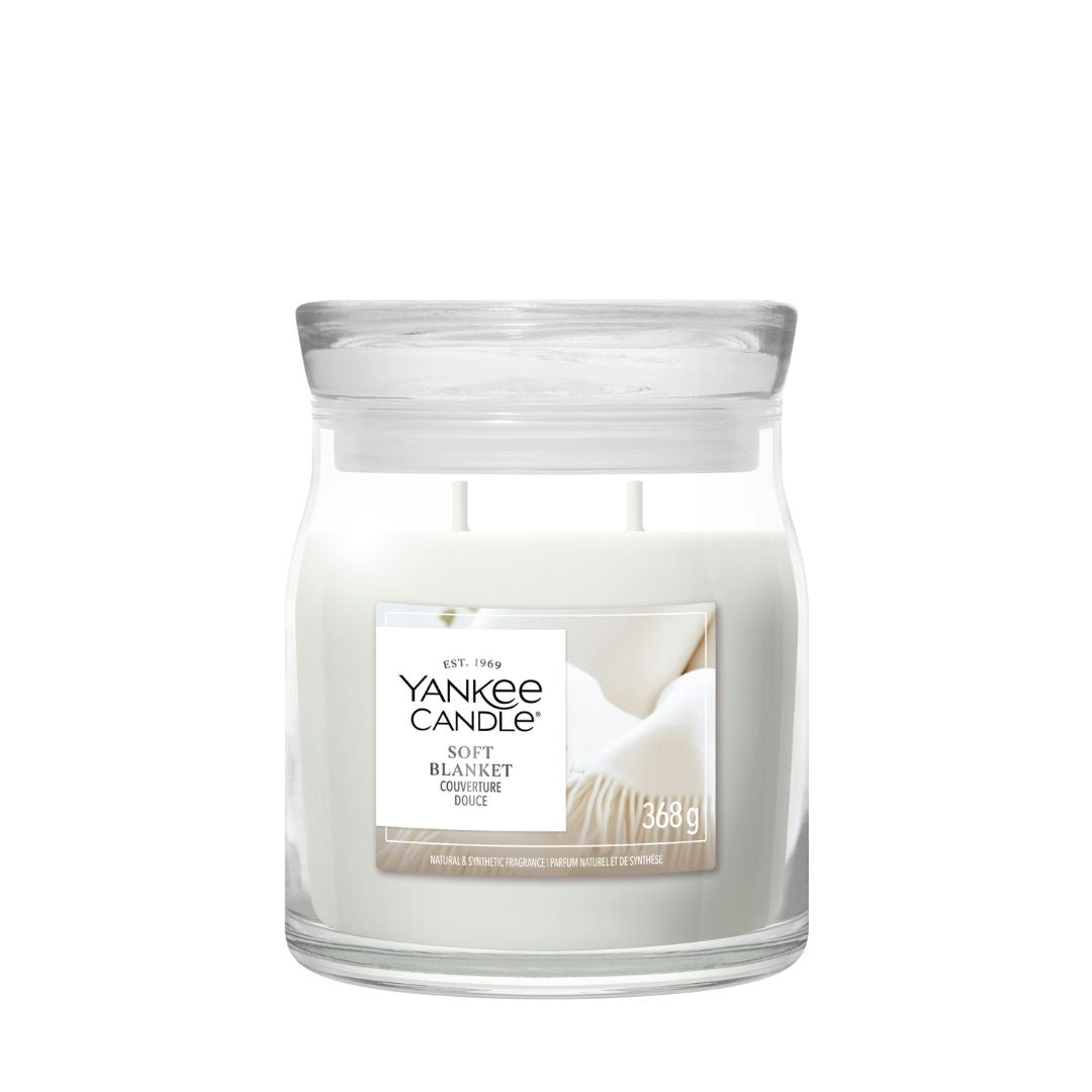 Candela Yankee Candle Soft Blanket media in giara di vetro.