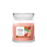 Candela Yankee Candle White Strawberry Bellini media in giara di vetro.