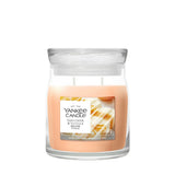 Candela Yankee Candle Tangerine & Vanilla media in giara di vetro.