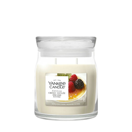 Candela Yankee Candle Vanilla Crème Brûlée media in giara di vetro.