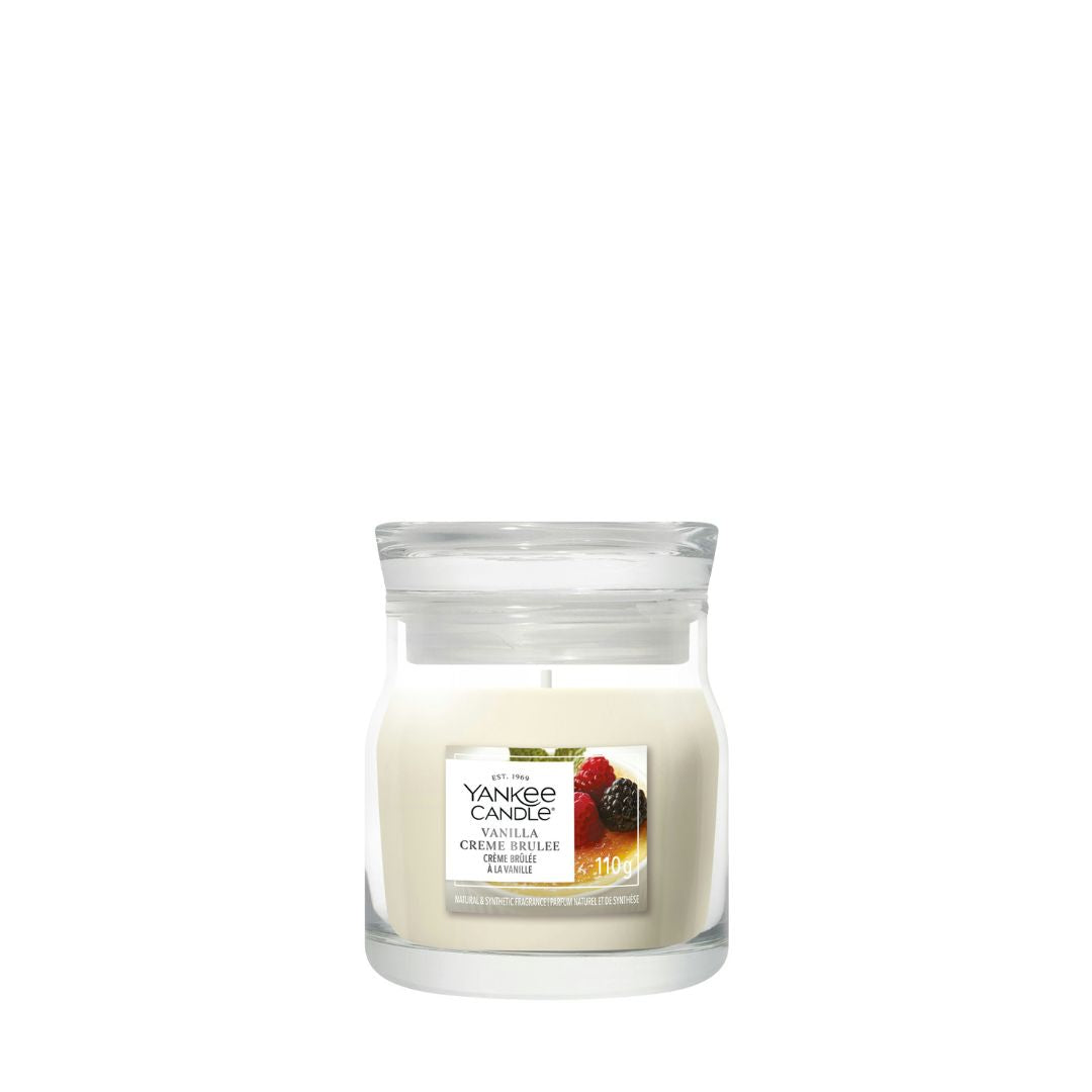 Candela Yankee Candle Vanilla Crème Brûlée piccola in giara di vetro.