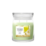 Candela Yankee Candle Vanilla Lime media in giara di vetro.