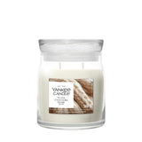 Candela Yankee Candle Warm Cashmere media in giara di vetro.