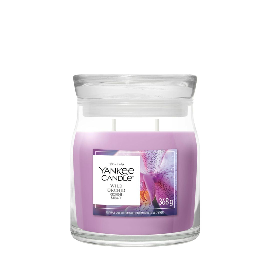 Candela Yankee Candle Wild Orchid media in giara di vetro.