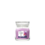 Candela Yankee Candle Wild Orchid piccola in giara di vetro.