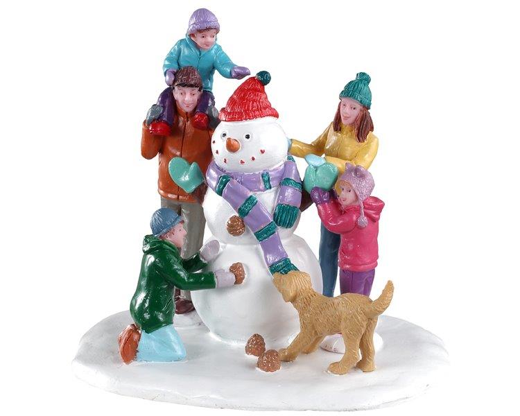 Snowman Teamwork 03511 - Personaggi Lemax costituiti da una famiglia con cane che costruisce un pupazzo di neve 