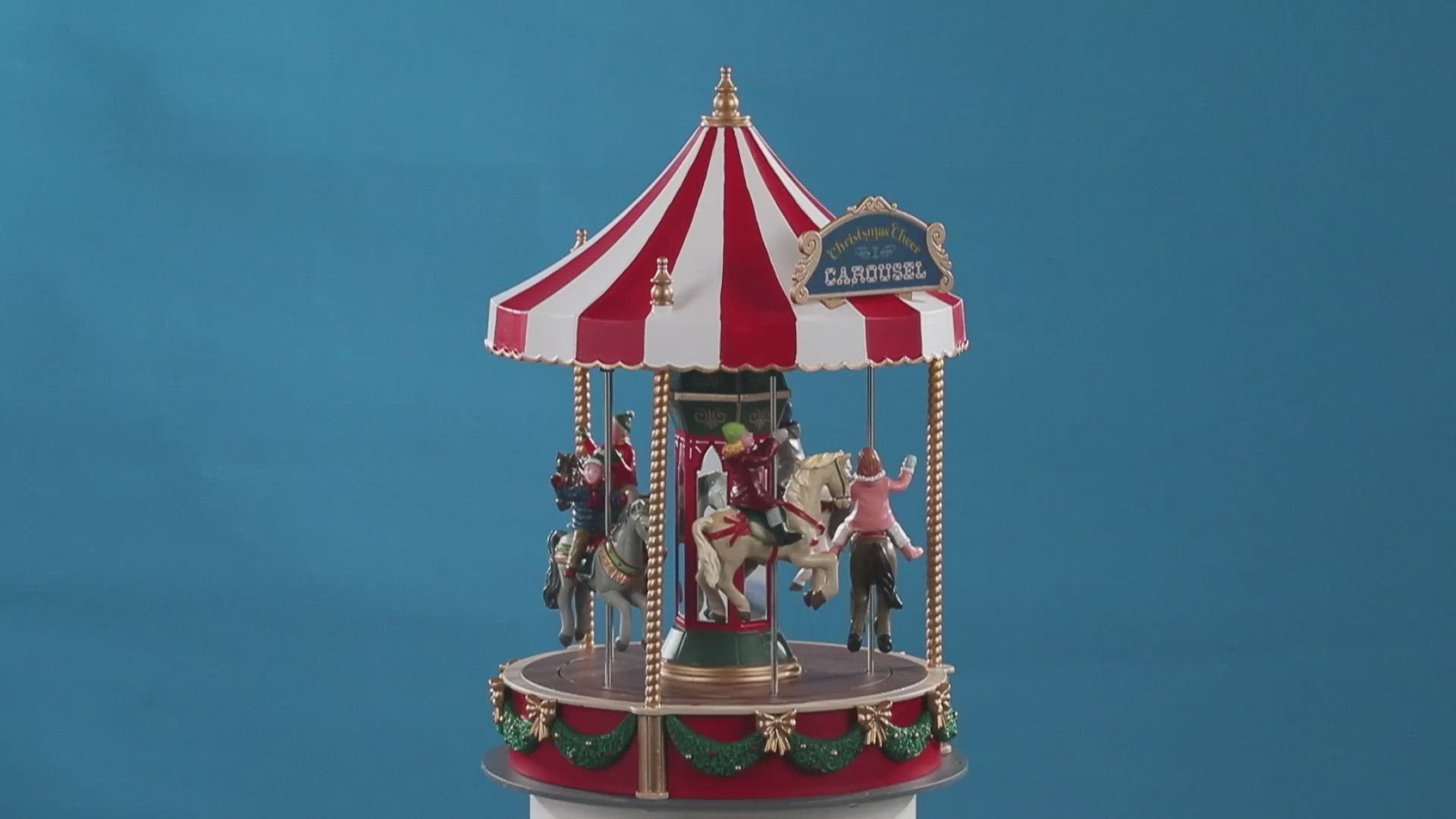 Video di giostra Lemax a batteria coi cavalli e musica - Christmas Cheer Carousel 14821