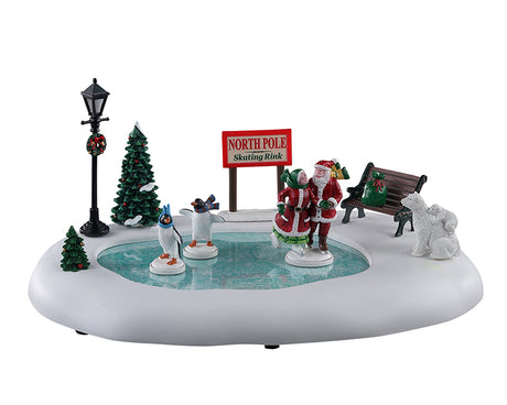 North Pole Skating Rink 14837 - Pista di pattinaggio Lemax con personaggi in movimento.