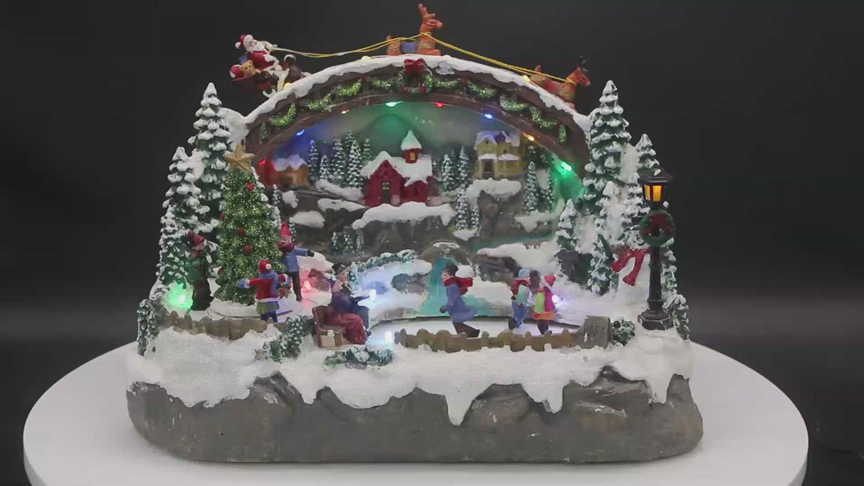 Villaggio con Babbo Natale e Bimbi che Pattinano - Villaggetto natalizio