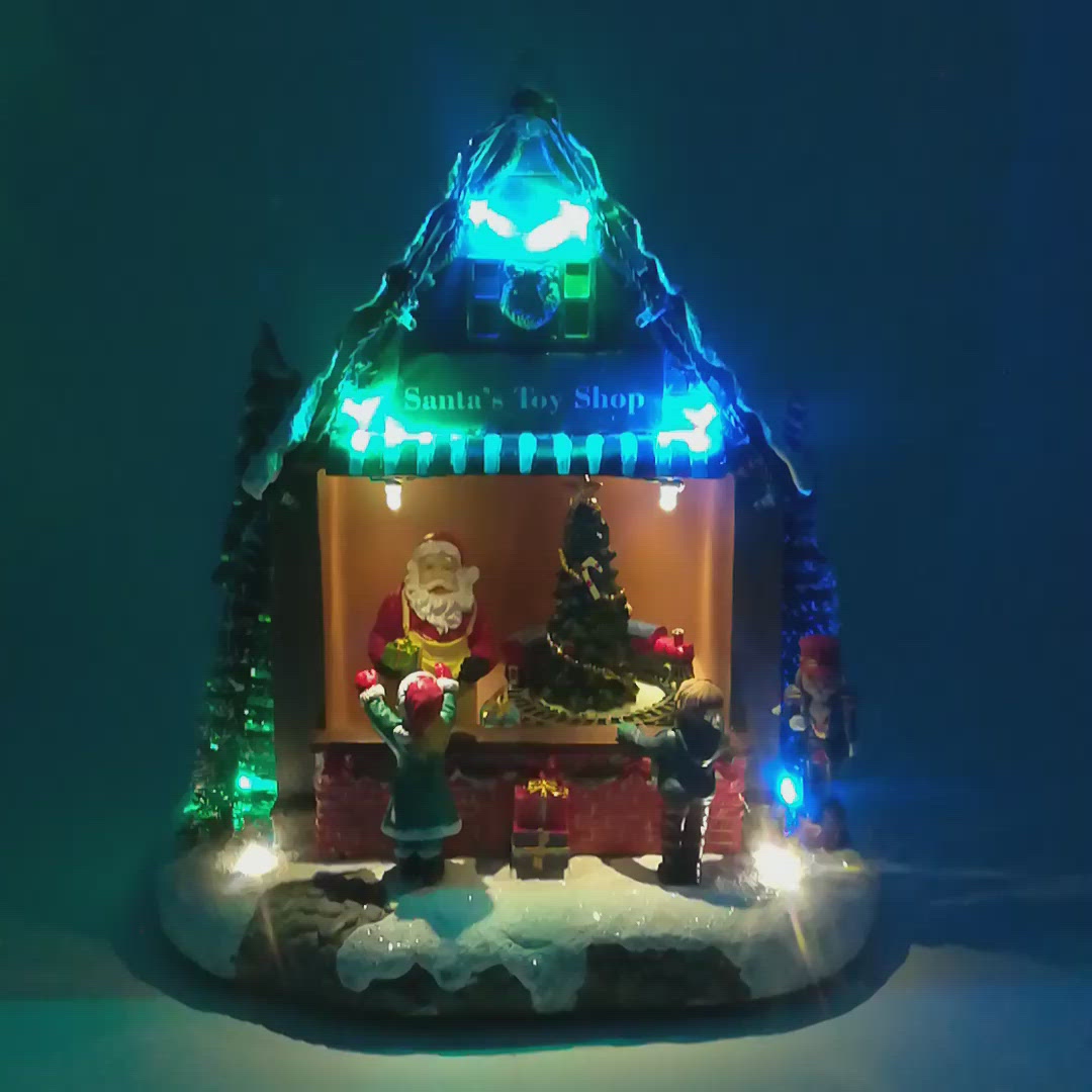 Negozio di Giocattoli di Babbo Natale con Treno che Gira a Batteria