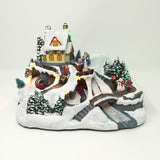 Villaggio con Bimbi, Treno che Gira e Fiume Luminoso Paesaggi e Scene Natalizie Garden Team